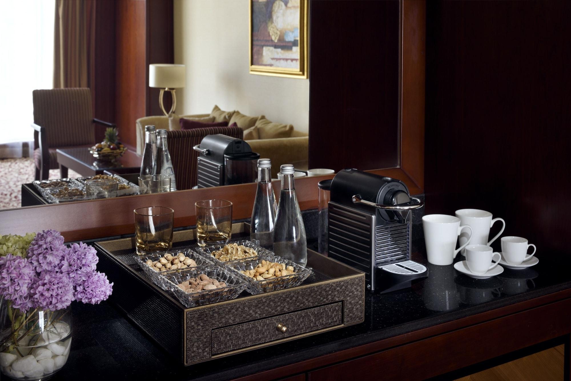 Mövenpick Hotel City Star Jidda Exteriör bild A Nespresso machine in a hotel room